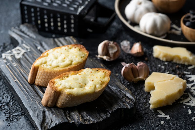 Crispy Garlic Dough Balls with herb butter dipping sauce